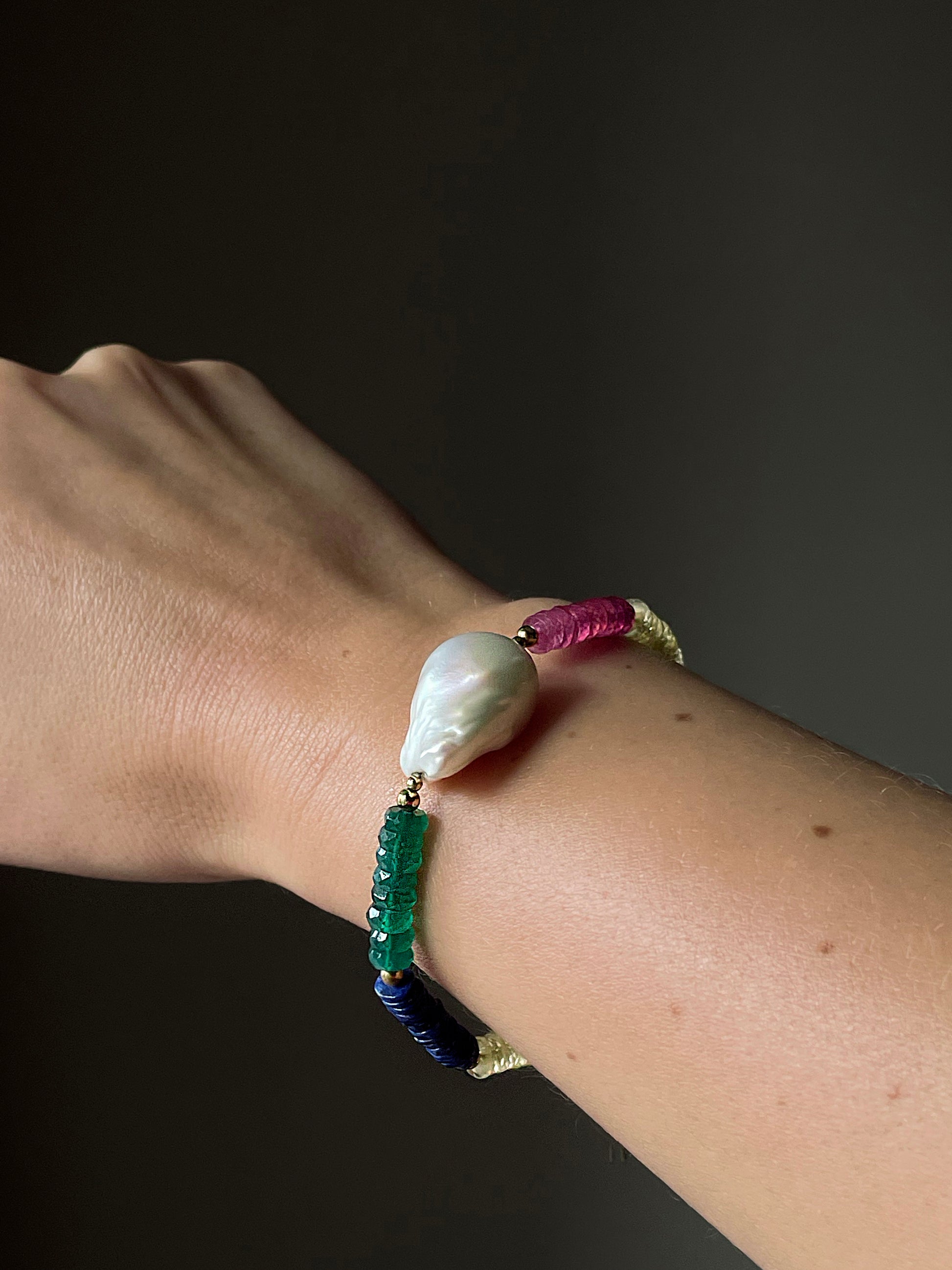 Accent Pearl Rainbow Bracelet styled on wrist – expressive, luxury jewelry that celebrates individuality by monái