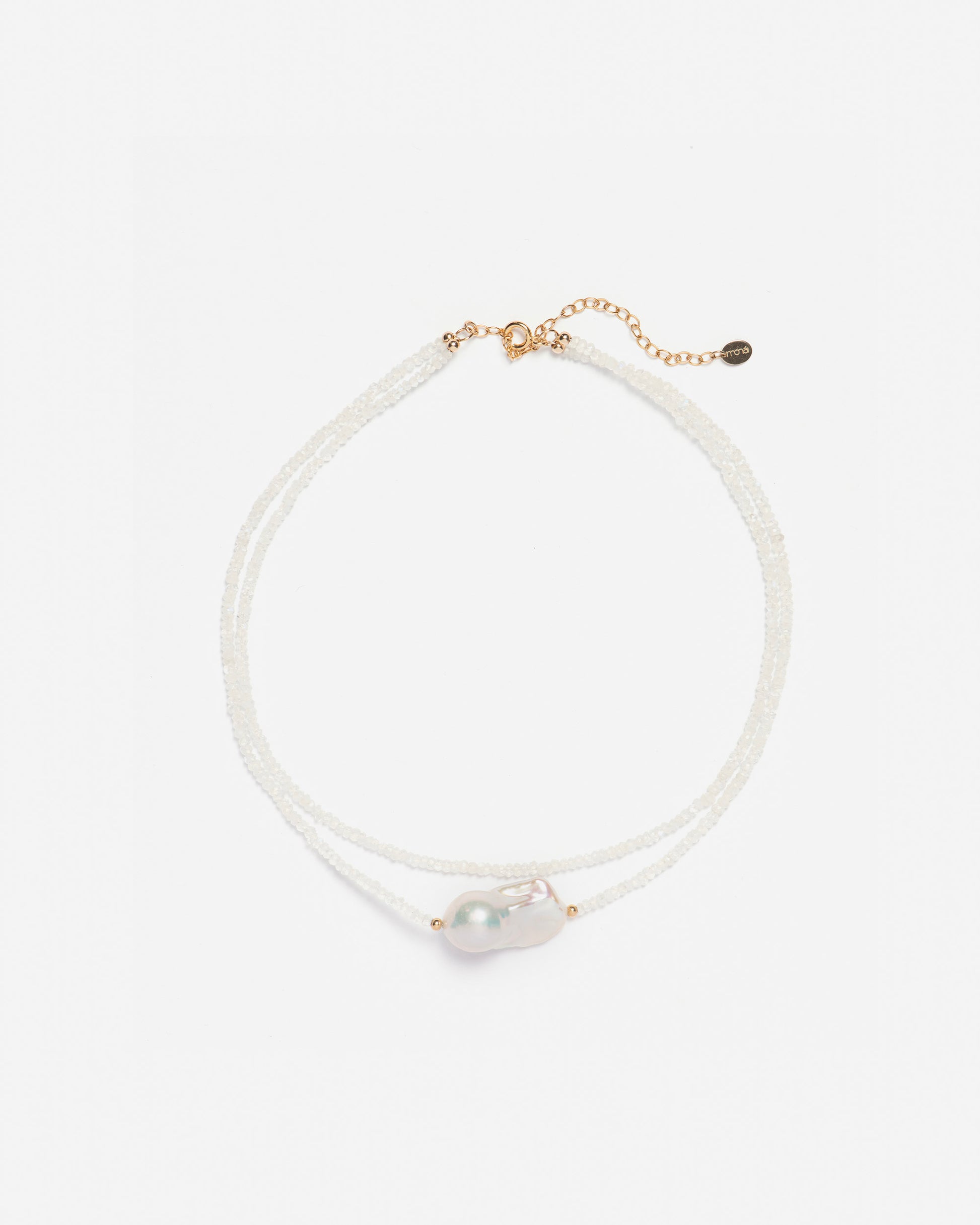 monái baroque pearl rainbow moonstone necklace laid flat – handcrafted design featuring luminous baroque pearls, milky rainbow moonstones, and 14K gold-filled hardware