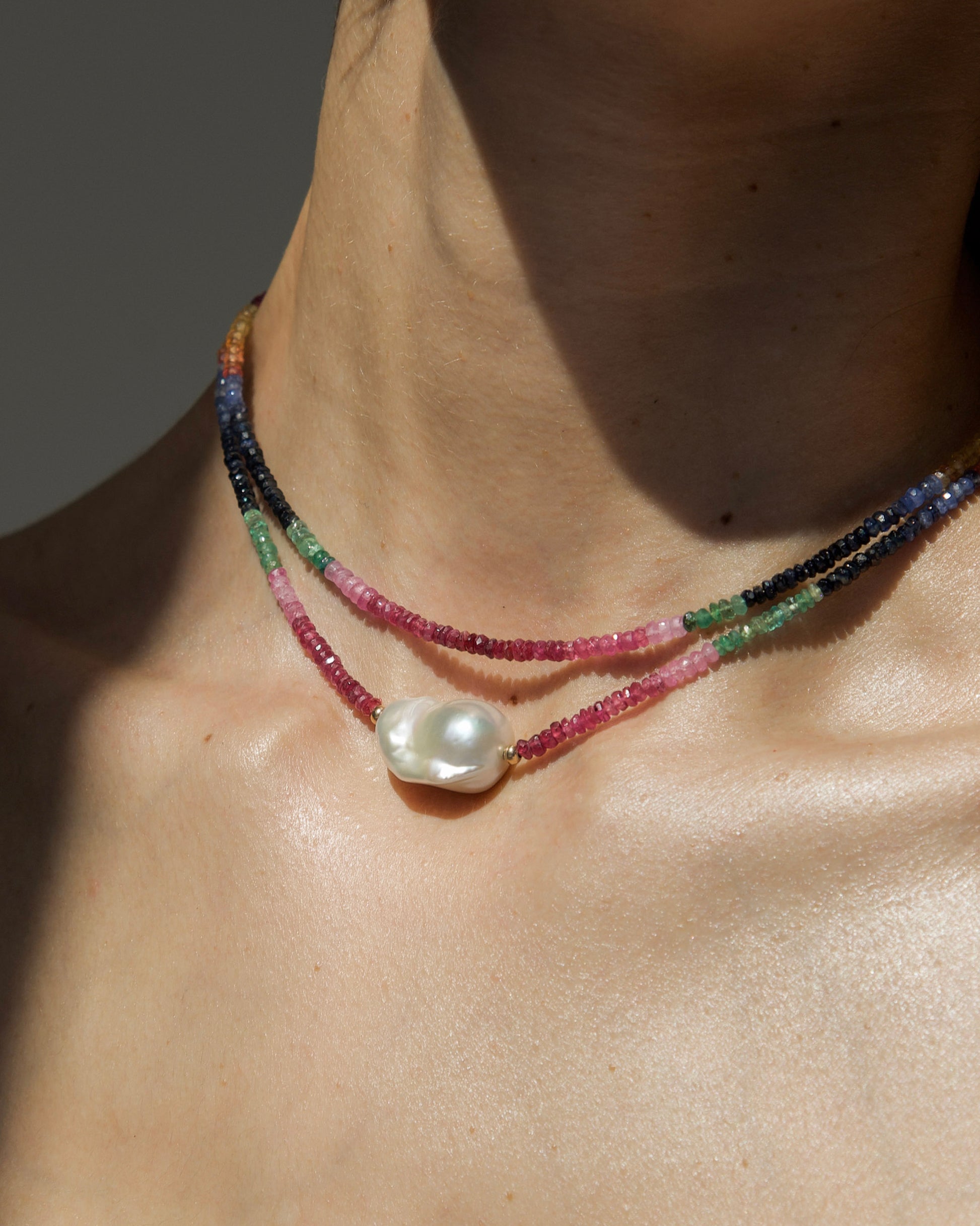 monái baroque pearl rainbow necklace worn by model – elegant layering of natural gemstones and pearls for a statement look