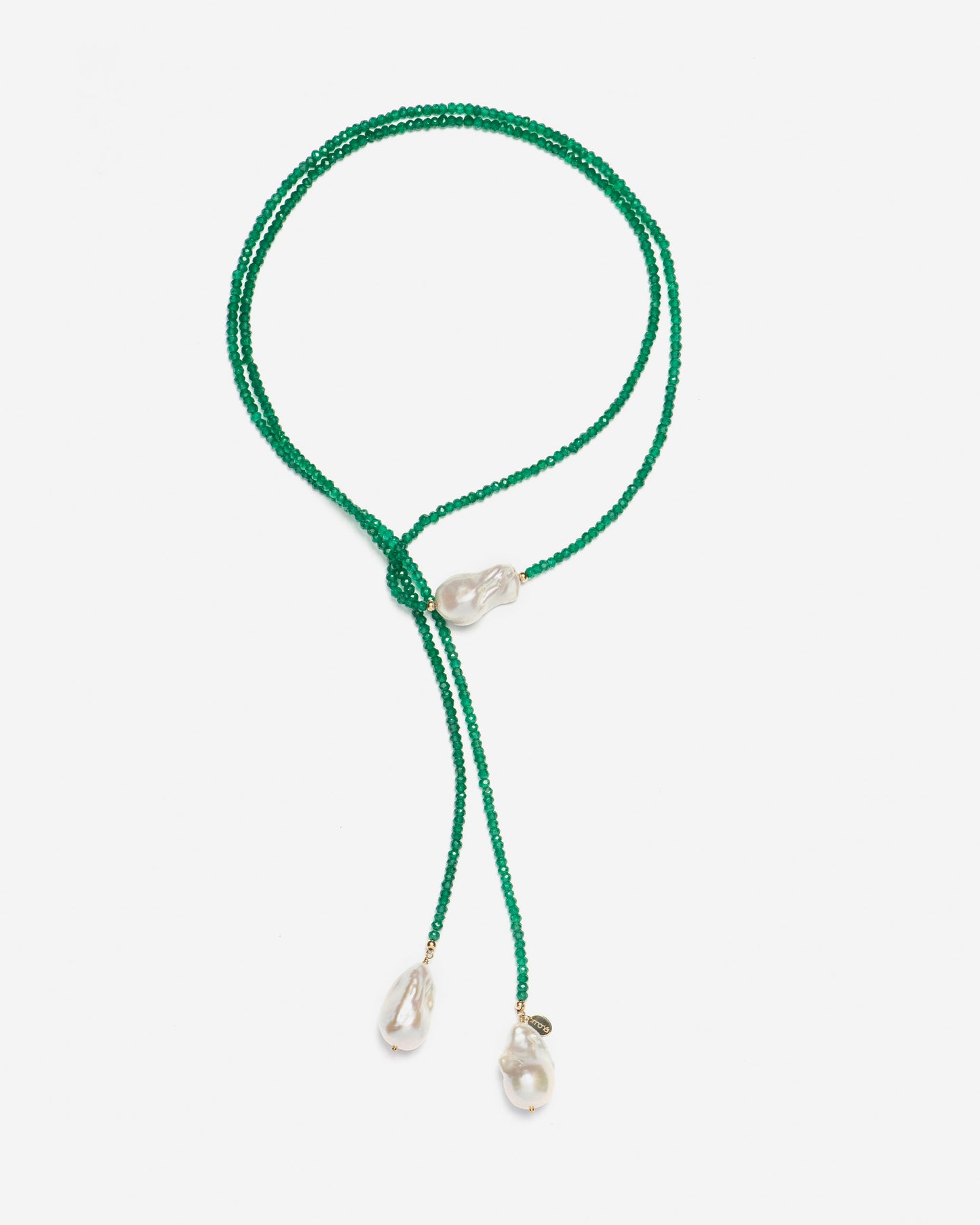 detailed view of luminous baroque pearls paired with vivid green onyx – monái’s signature contrast of raw and refined