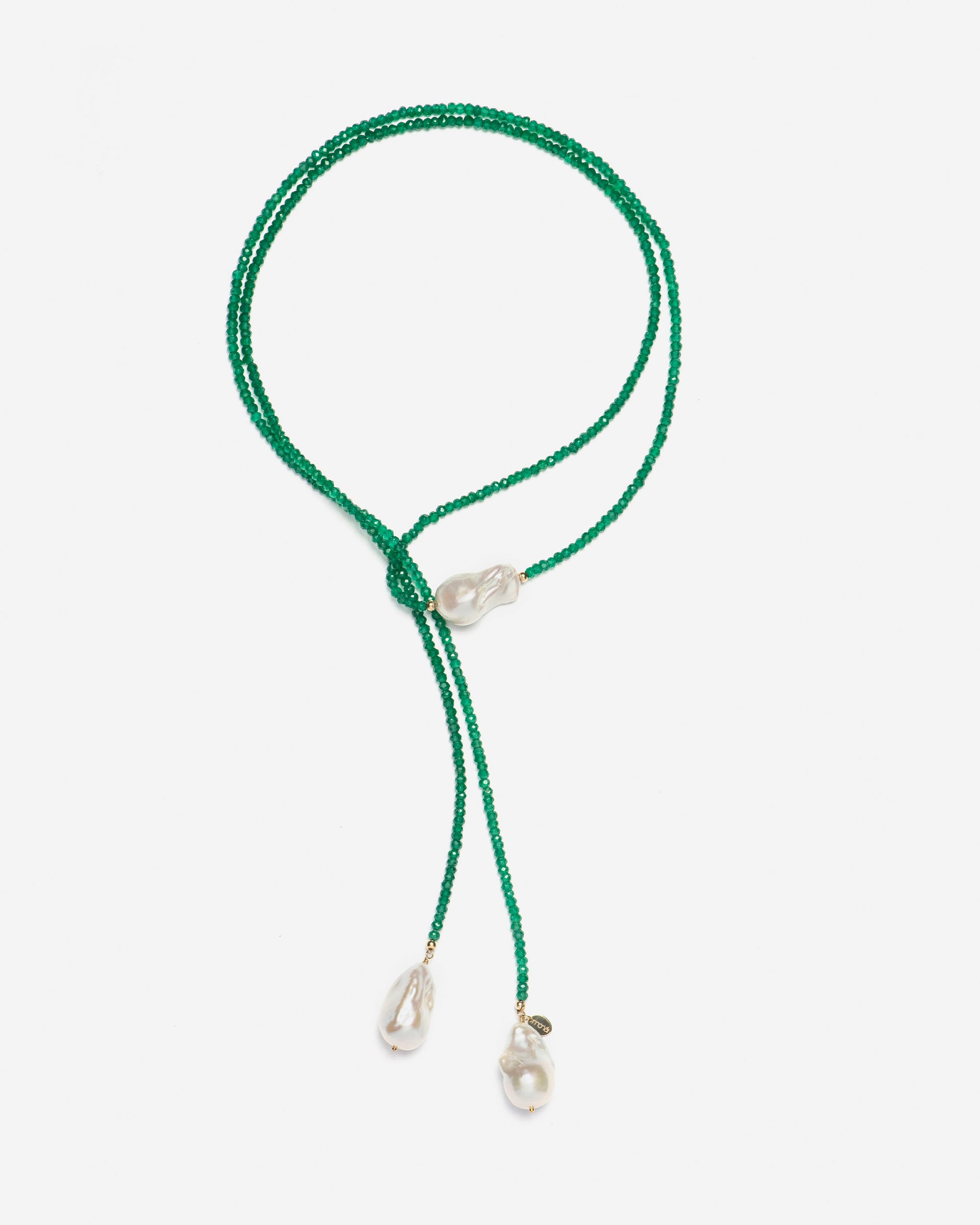 detailed view of luminous baroque pearls paired with vivid green onyx – monái’s signature contrast of raw and refined