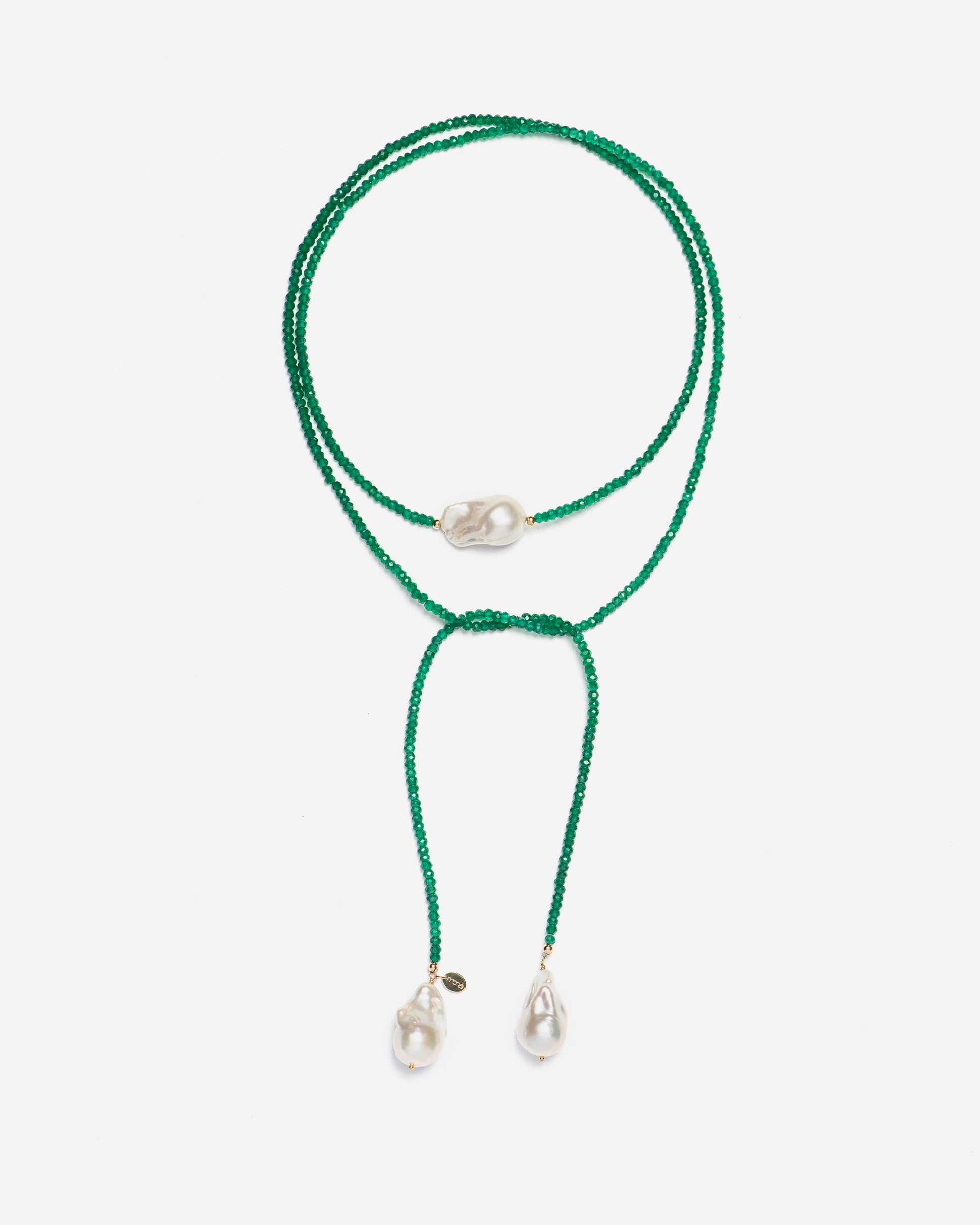 monái long baroque pearl green onyx necklace styled in a folded, scarf-like wrap – showcasing the artistic freedom to shape jewelry uniquely each time