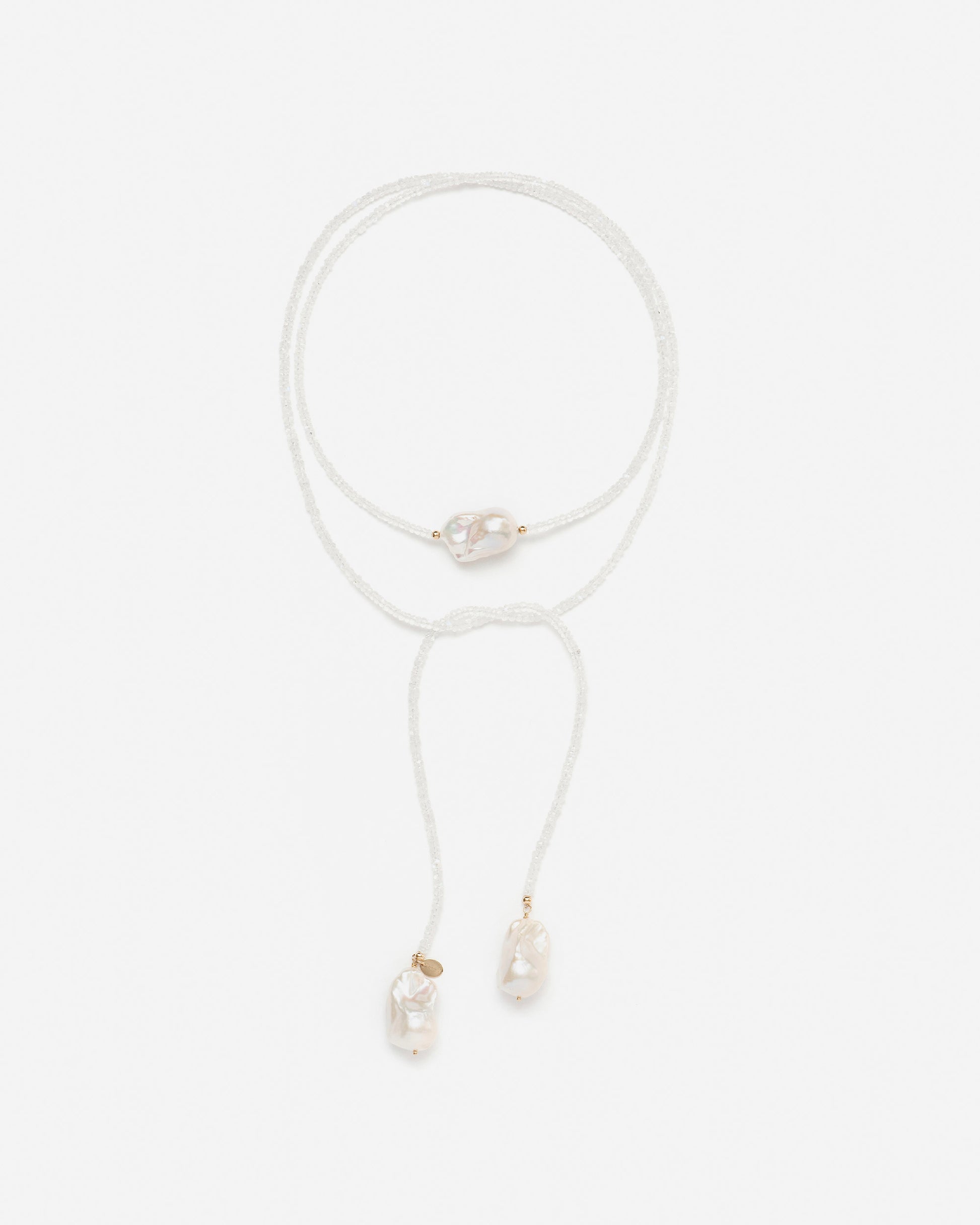 monái long baroque pearl rainbow moonstone necklace laid flat – handcrafted design featuring luminous baroque pearls, milky rainbow moonstones, and 14K gold-filled hardware
