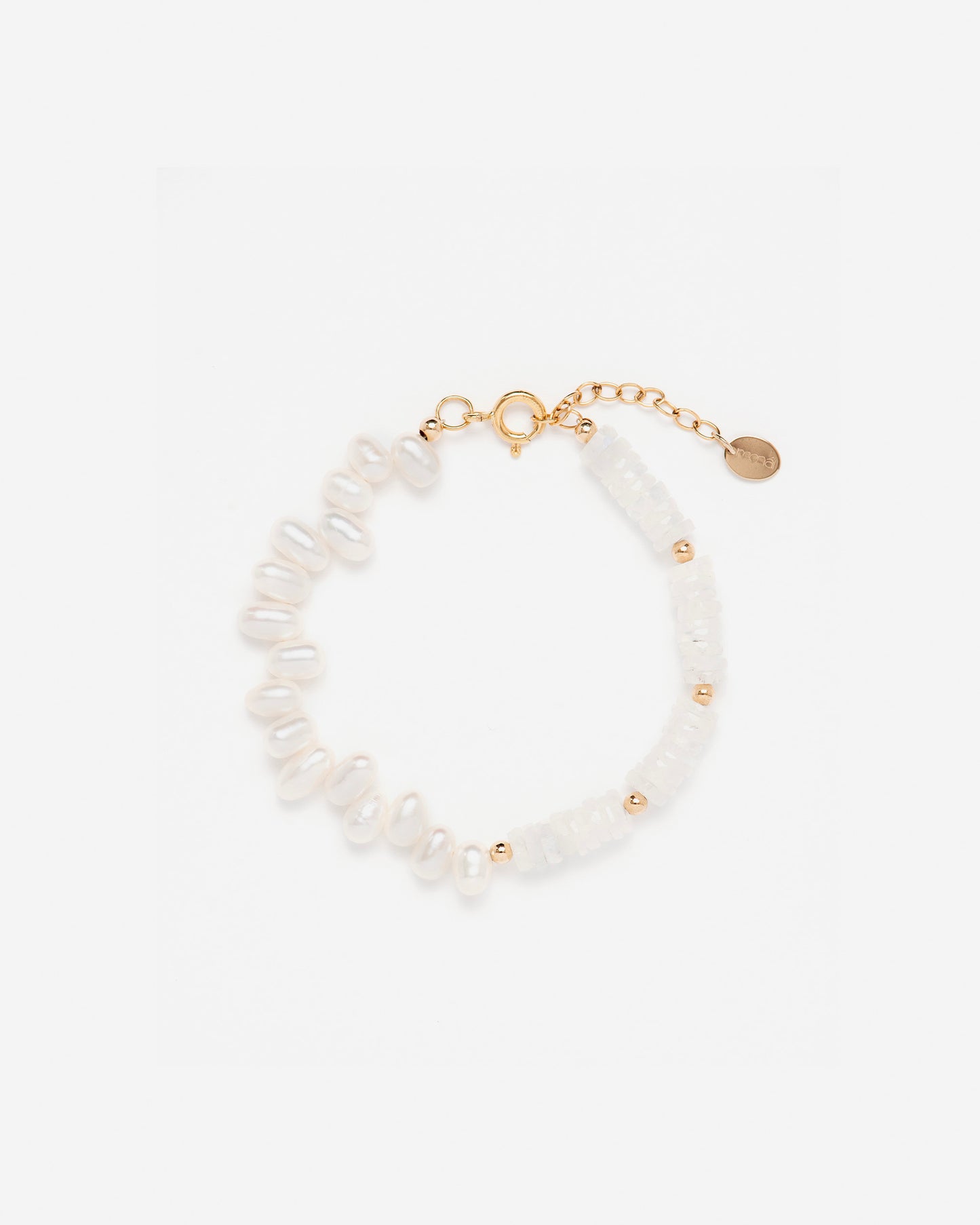 monái rainbow moonstone asymmetrical bracelet laid flat – handcrafted design featuring luminous baroque pearls, milky rainbow moonstones, and 14K gold-filled hardware